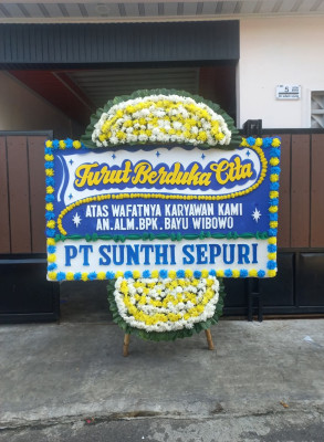 Papan Bunga Duka di Sumber